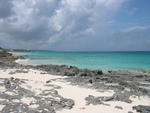 A rocky beach near the reefs that guard the Mermaid Village of West Xylophone
